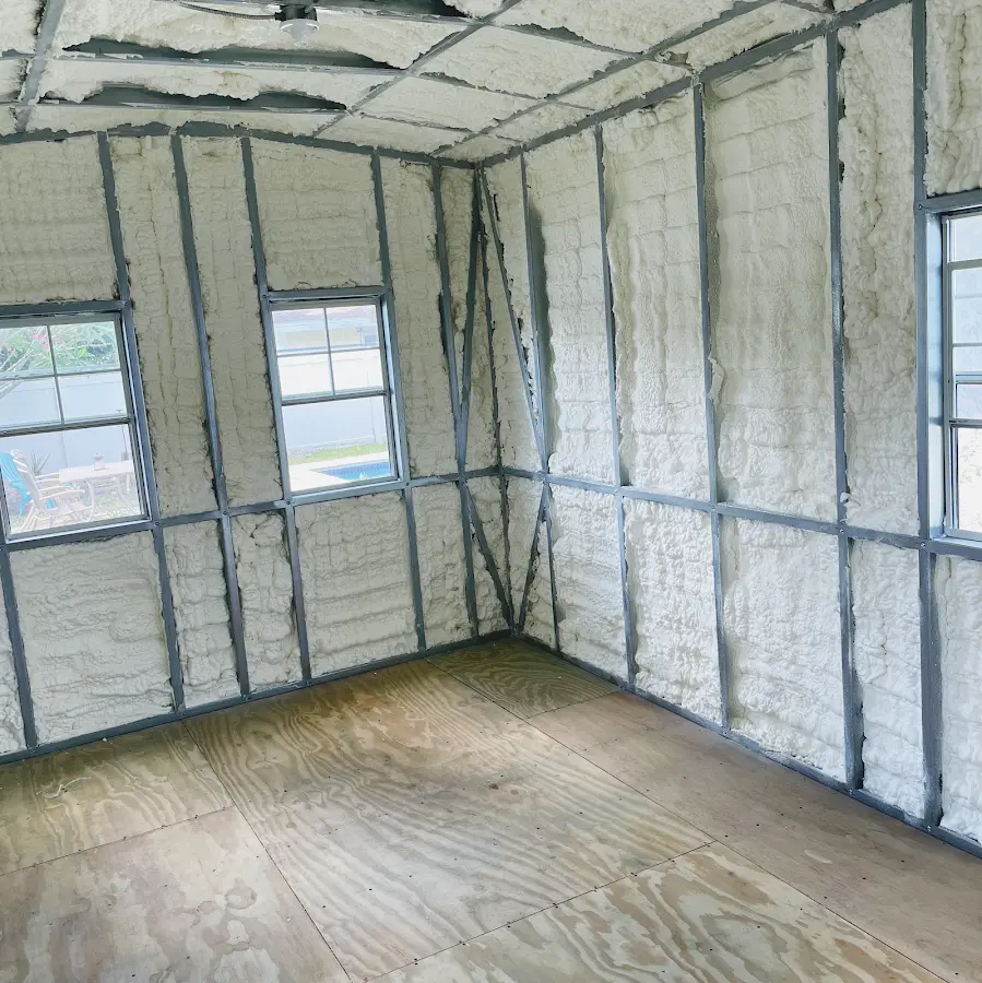 Closed-cell spray foam insulation applied to wall cavities in a residential project in Southwick